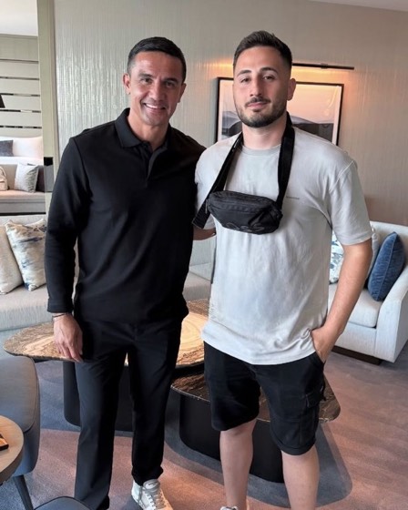 Nicholas Remondos with Tim Cahill